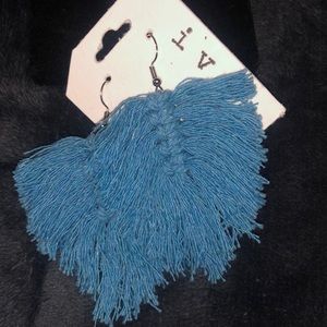 Handmade macrame earrings in blue.